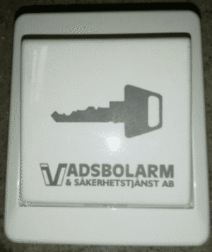 Öppnaknapp ELKO Graverade Nyckel Logo Vadsbolarm